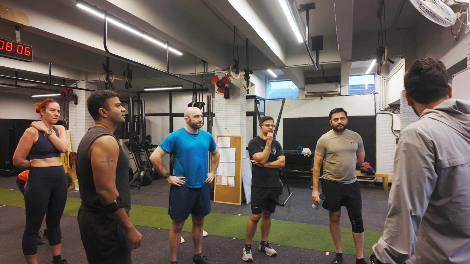 Athletes mid-session on the training floor at The Boxx